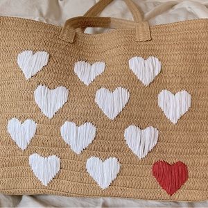 Woven Tote Bag with Linen Liner and intricate heart detail.